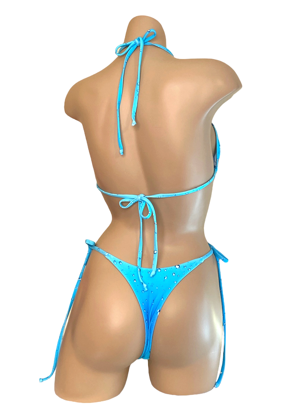 High cut, v-front, tie side, cheeky thong bikini bottoms and triangle top in blue rain print back view