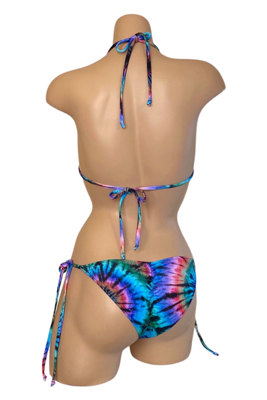 Low waist, tie side, ruched back bikini bottoms and triangle top in tie dye print back view