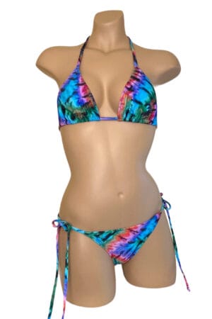 Low waist, tie side, ruched back bikini bottoms and triangle top in tie dye print front view