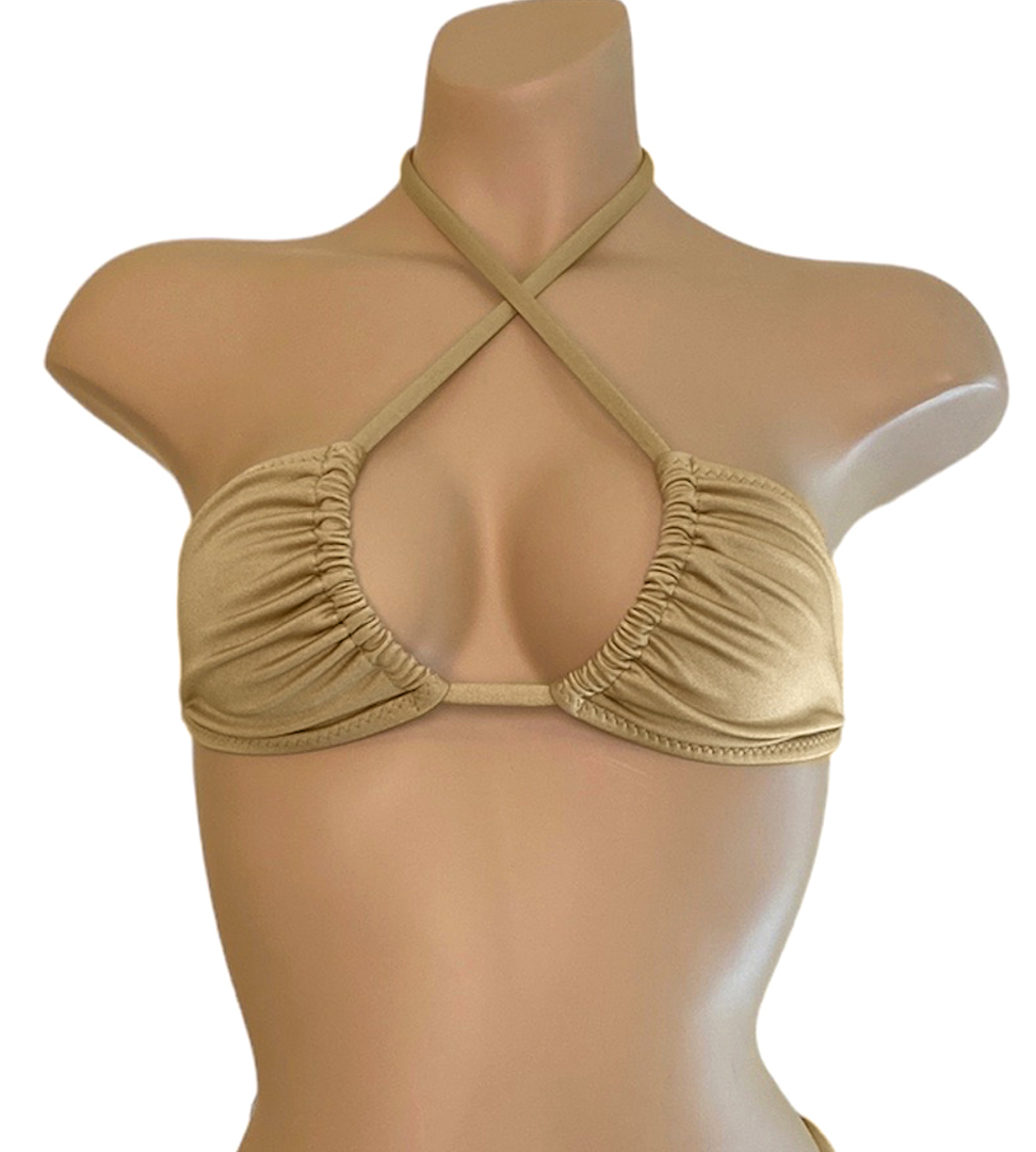 Gold triangle bikini top worn sideways