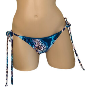 Low waist reversible tie side bikini bottoms in aqua leopard print with solid teal on the reverse front view