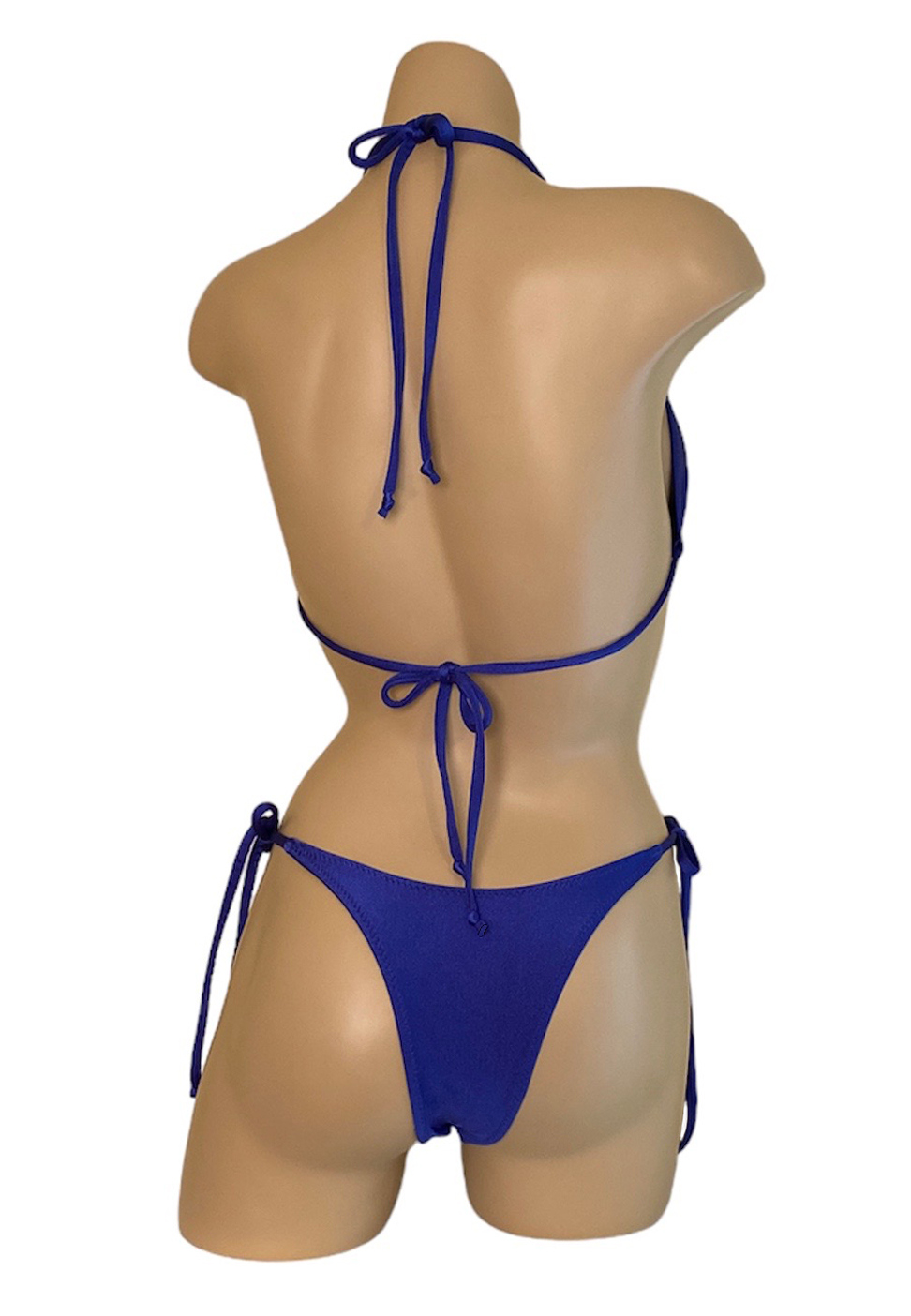 High cut tie side bikini bottoms and triangle top in royal blue back view