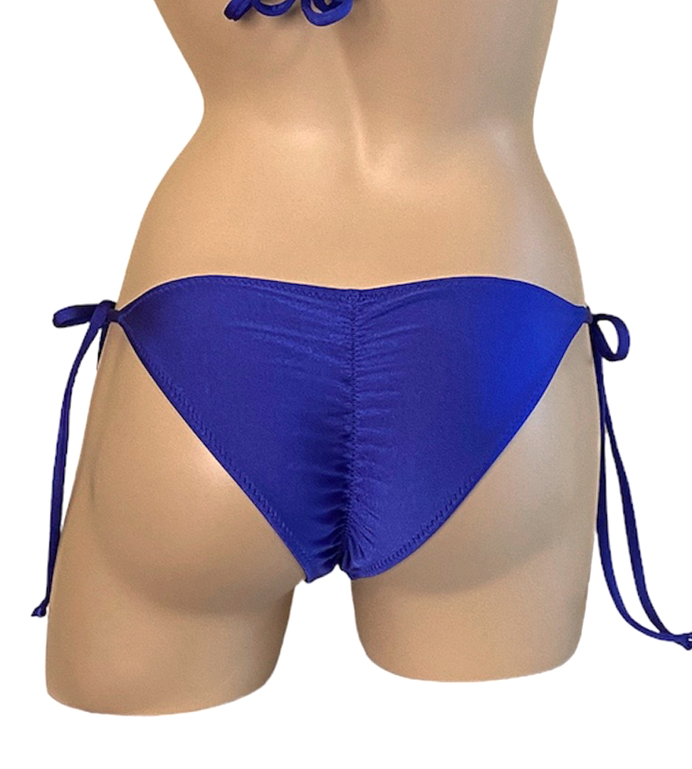 Low waist tie side ruched back bikini bottoms in royal blue back view