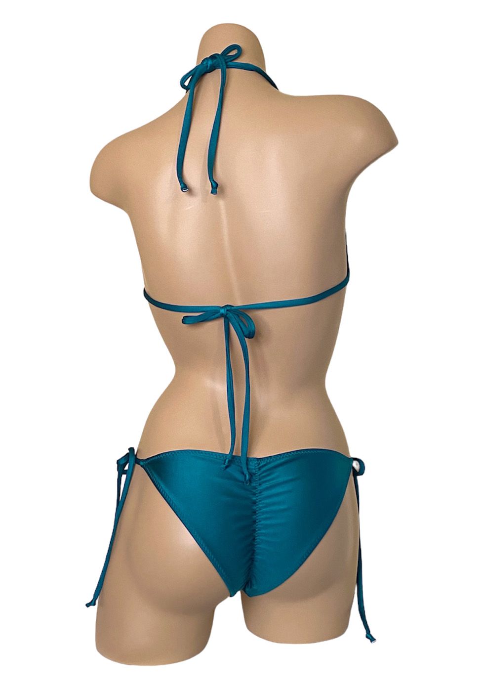 Low waist, tie side, ruched back bikini bottoms and triangle top in teal back view
