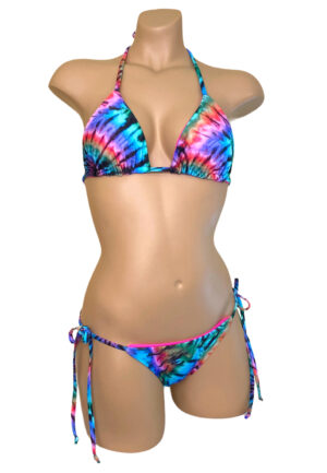 Reversible, low waist, tie side bikini bottoms and triangle top in tie dye print with hot pink on the reverse front view