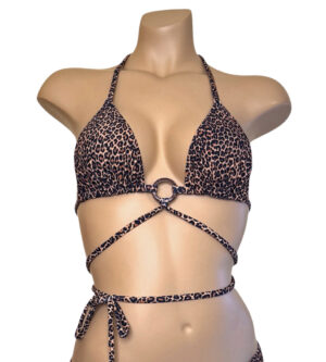 Strappy triangle bikini top with coconut ring at center in cheetah print front view