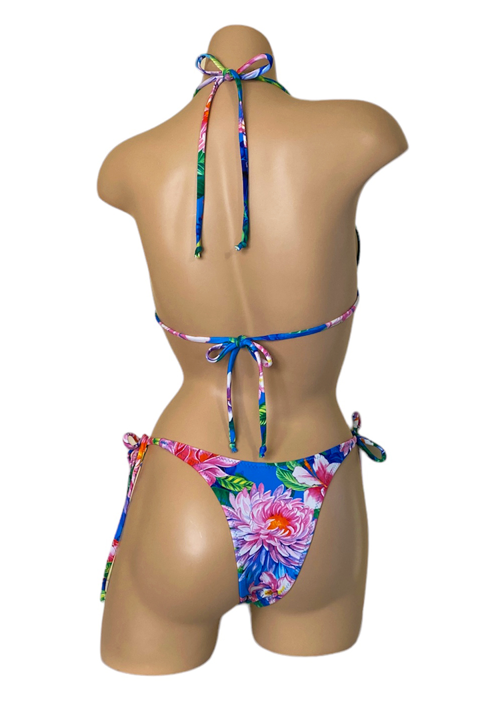 High cut tie side bikini bottoms and triangle top in floral print back view