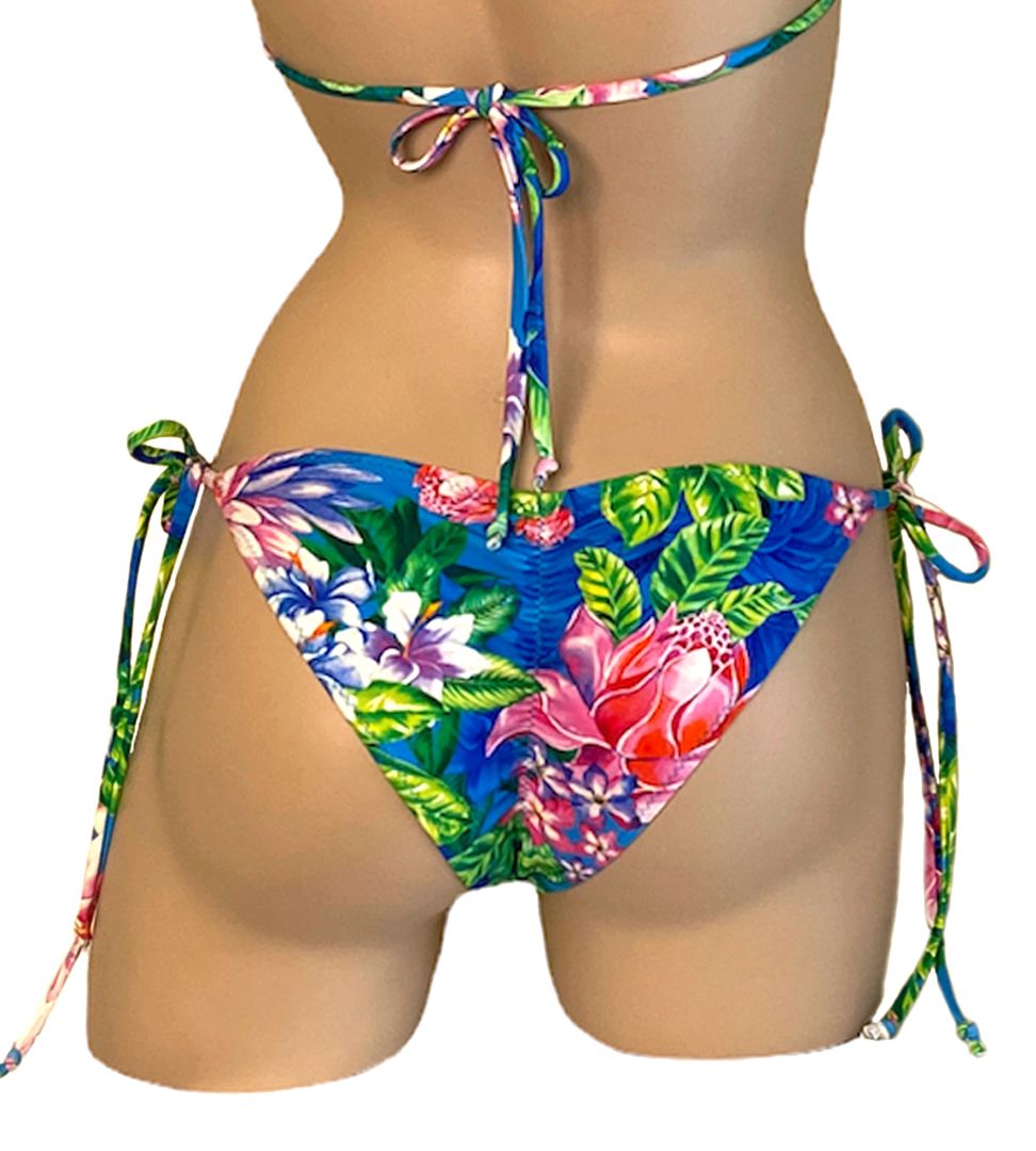 Low waist tie side ruched back bikini bottoms in tropic floral print back view