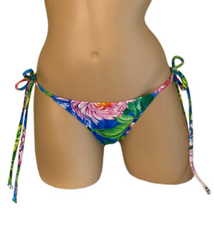Low waist tie side ruched back bikini bottoms in tropic floral print