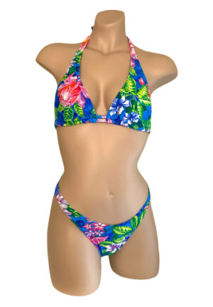 High cut cheeky ruched back bikini bottoms and double strap halter bikini top in tropic floral print front view