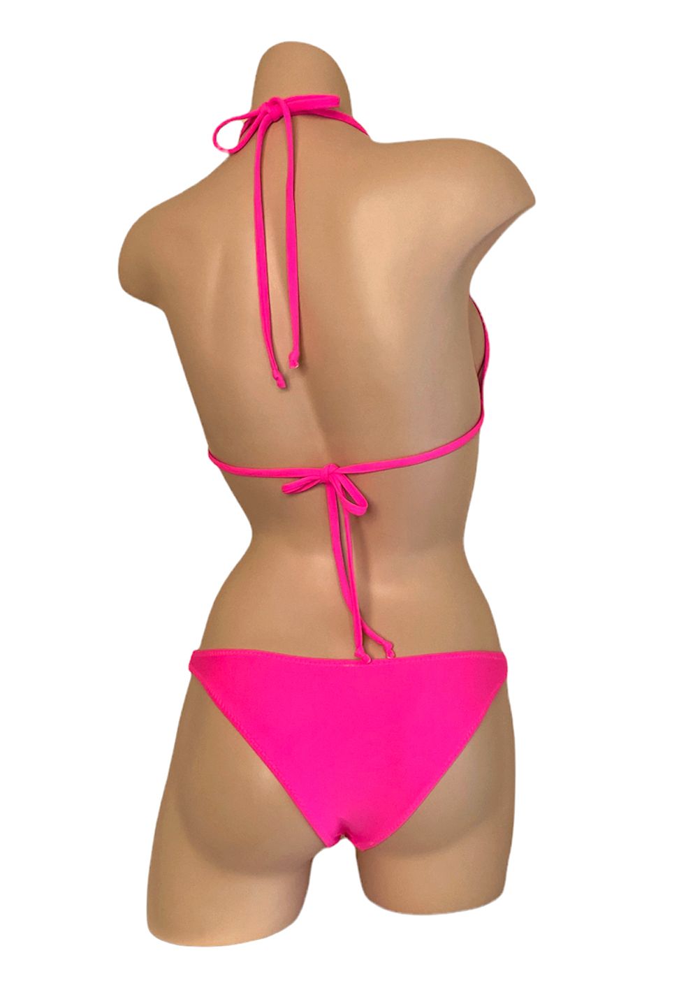Low rise, sporty bikini bottoms and triangle bikini top in hot pink back view