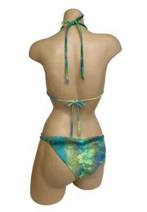 Low waist double strap fixed side ruched back bikini bottoms in green floral halographic print back view