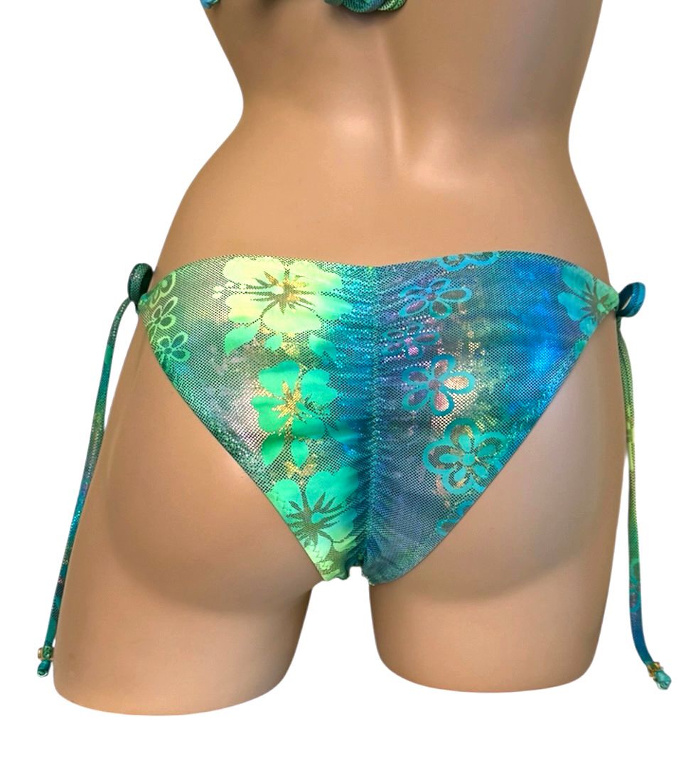Low waist, tie side, ruched back beaded bikini bottoms in green floral holographic print back view