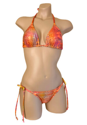Low waist tie side ruched back bikini bottoms with triangle top in orange floral print and beads front view