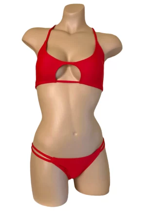 Low waist, double strap sides, ruched back bikini bottoms and adjustable Peek a boo bikini top in carmino red front view