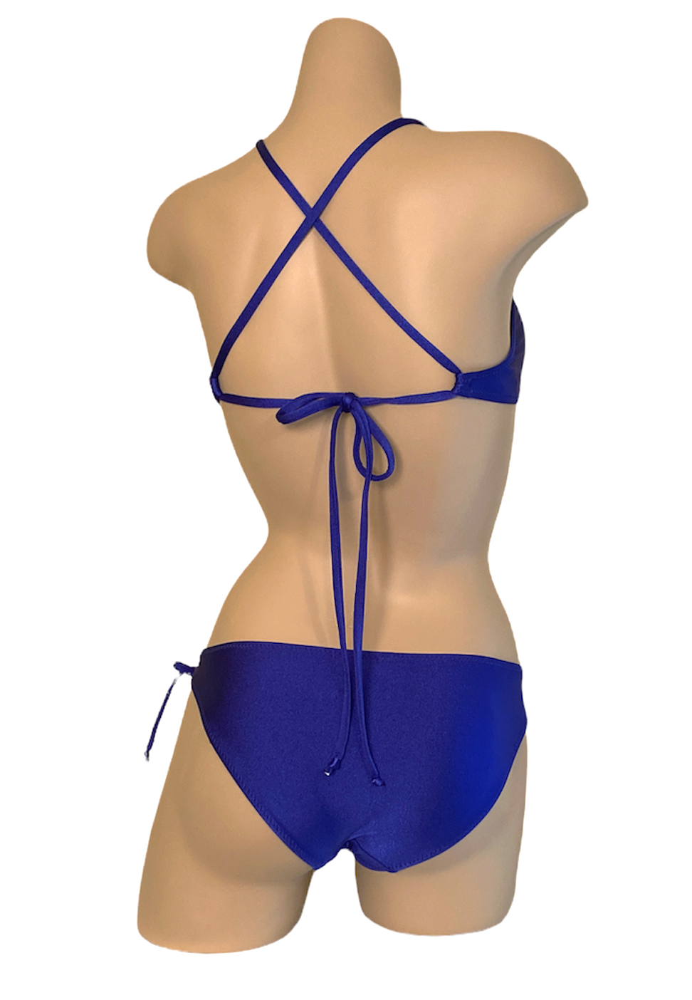 Low waist, tie side, moderate bikini bottoms and matching loop front cross back bikni top in Royal blue back view