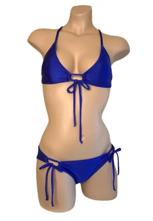 Adjustable, royal blue tie side bikini bottoms and matching cross back adjustable bikini top front view
