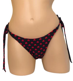 High cut, tie side, reversible bikini bottoms in red hearts print front view
