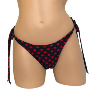 High hip tie side reversible bikini bottoms in red hearts print front view