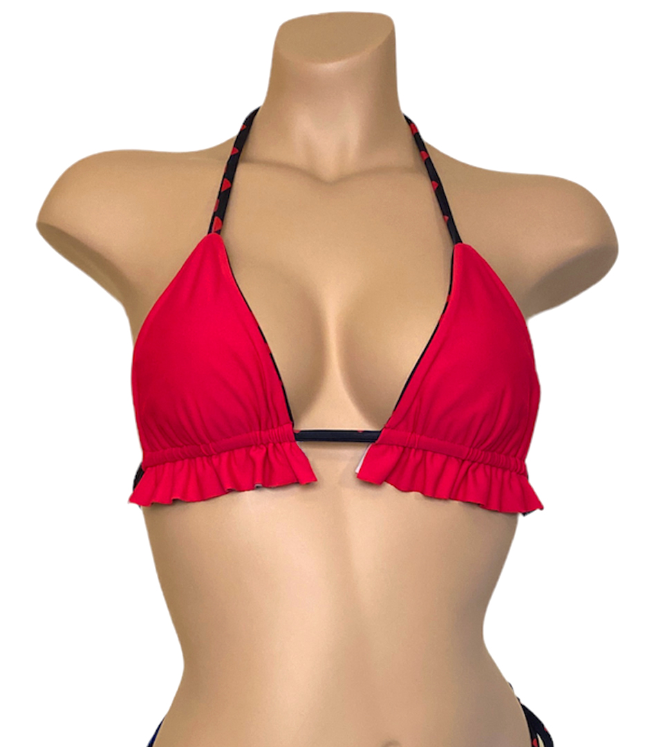 Ruffled reversible bikini top in red hearts print red side front view