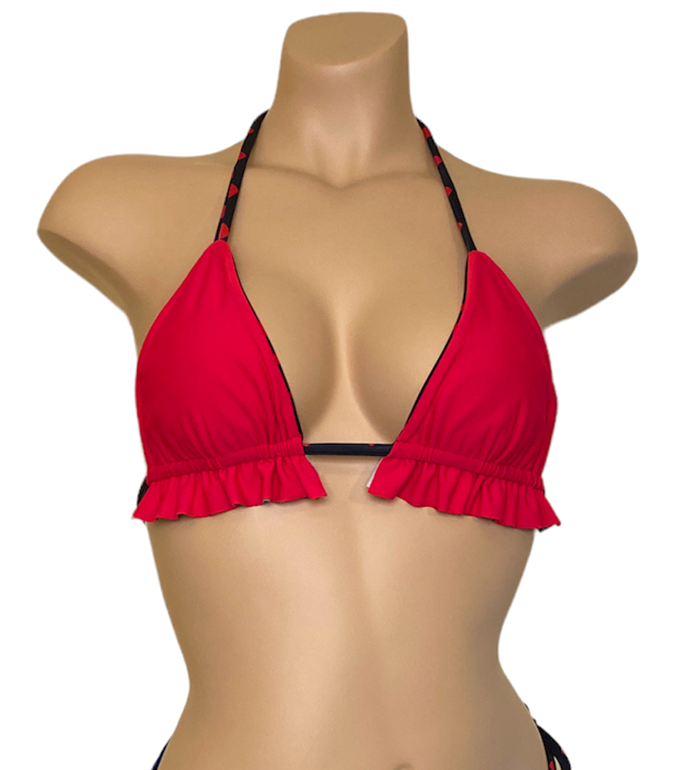 Ruffled reversible bikini top in red hearts print front view reverse side