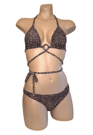 Low rise sporty bikini bottoms and strappy triangle top with coconut ring at center in cheetah print