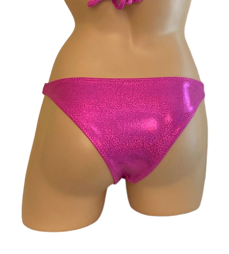 Low waist hip hugging bikini bottoms in glitter pink back view