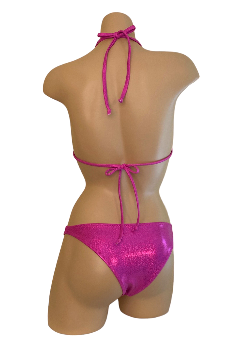 Low waist hip hugging bikini bottoms with triangle bikini top in glitter pink back view