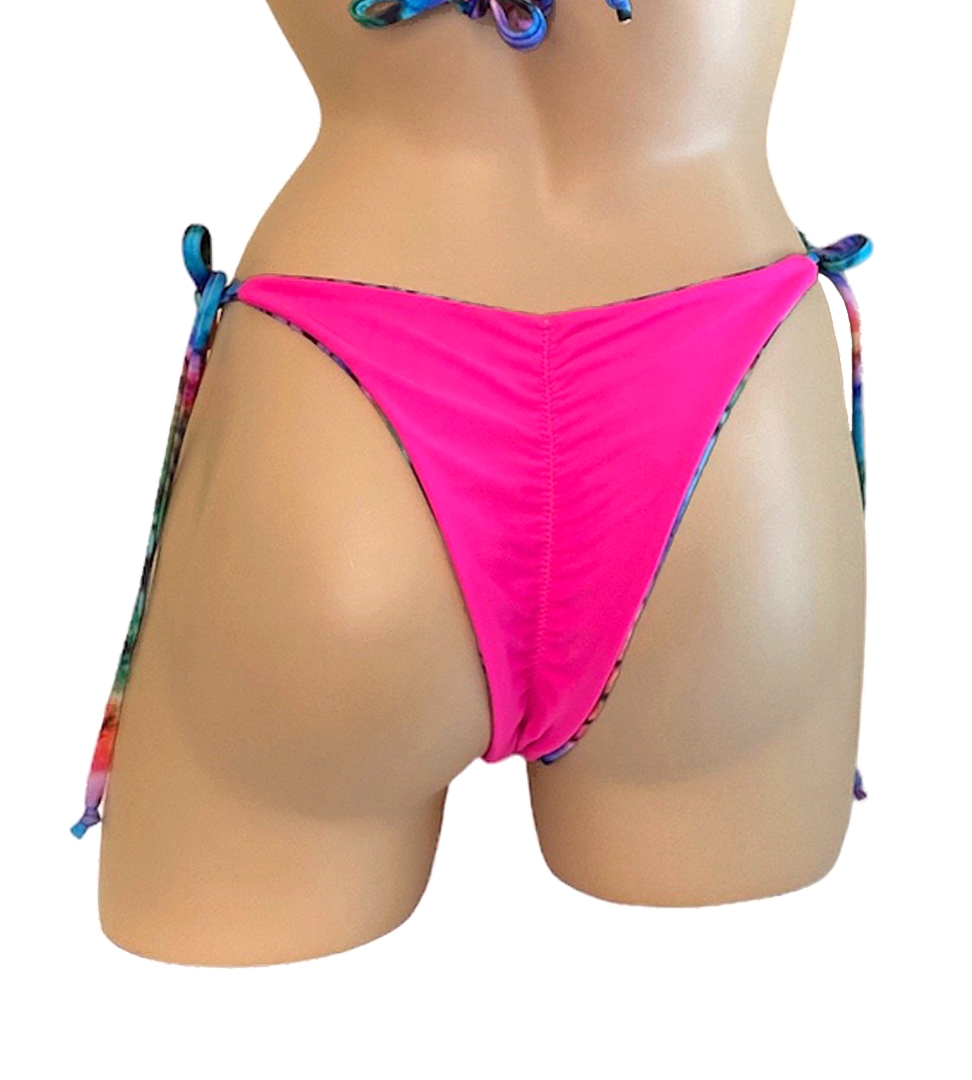 Reversible high cut tie side ruched back bikini bottoms in tie dye pink side back view