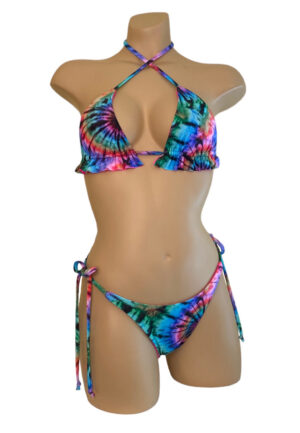 High cut tie side reversible bikini bottoms and reversible ruffle triangle top in tie dye print