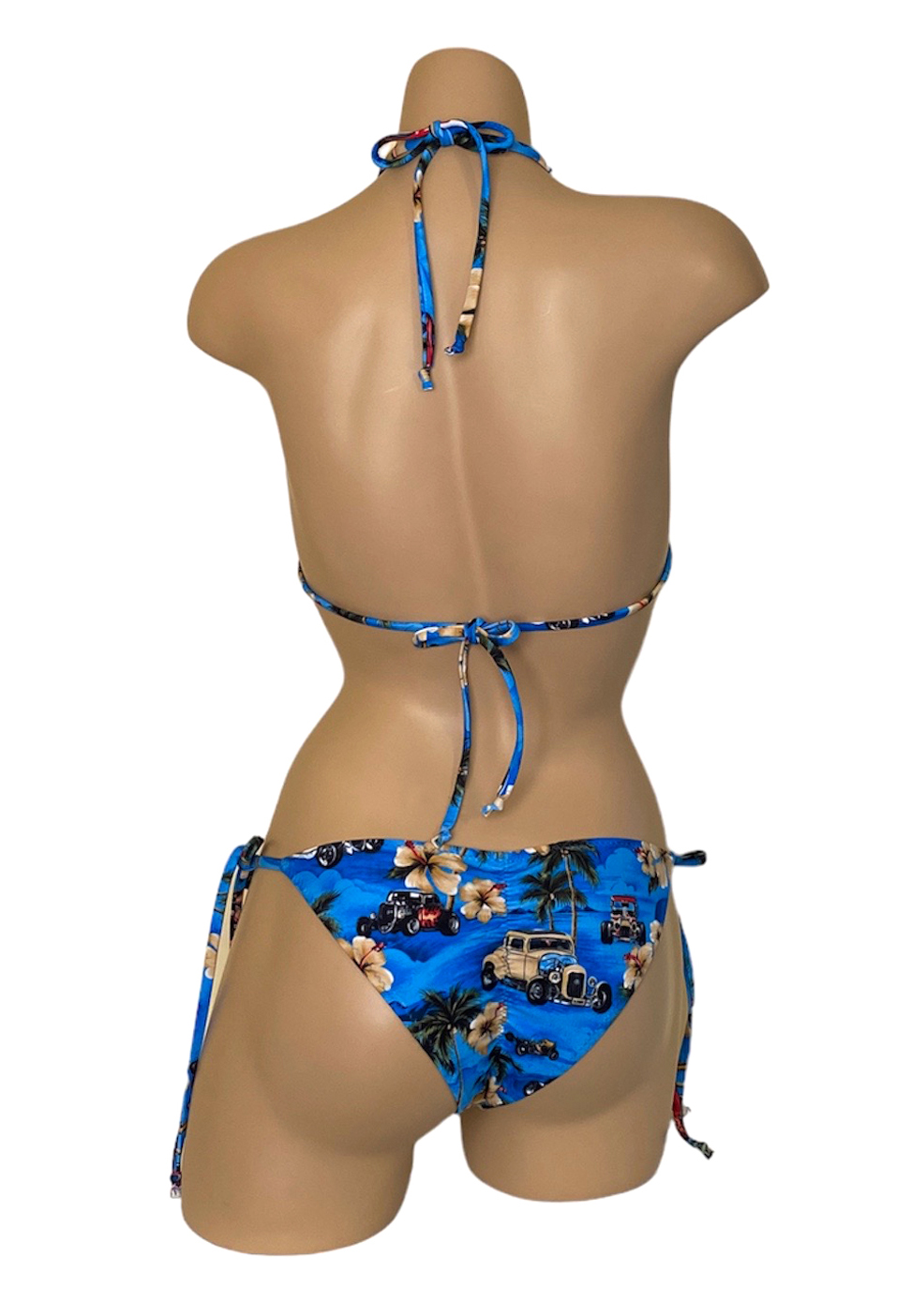 Low waist tie side ruched back bikini bottoms and triangle top in vintage hawaii print back view