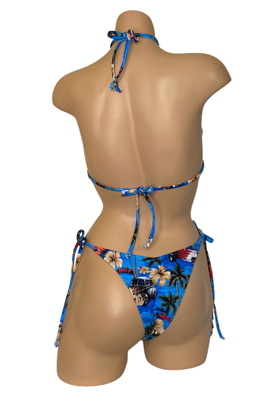 High hip tie side ruched back bikini bottoms with triangle bikini top in vintage hawaii print back view