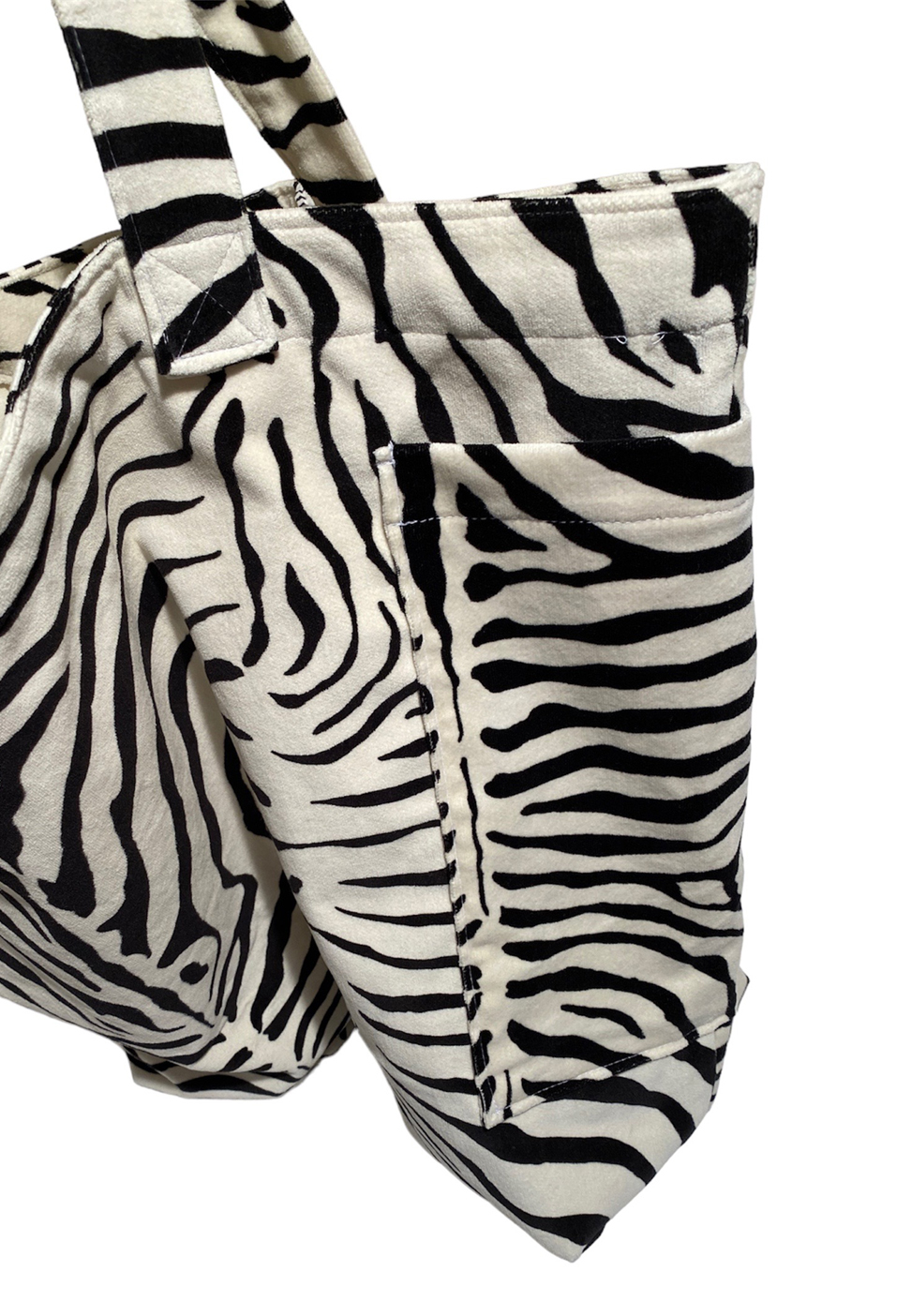 faux suede zebra print beach bag side pocket view