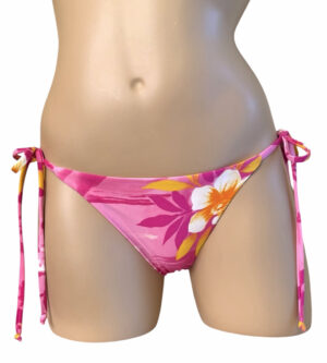 Reversible low waist, tie side, ruched back kiki bikini bottoms with yellow on the reverse front view