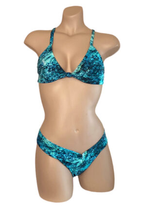 Reversible, mid hip, wide band, cheeky bikini bottoms and adjustable knotted front cross back bikini top in blue marble print front view