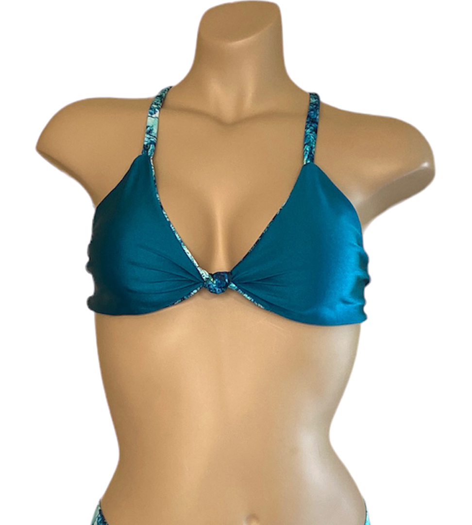 Reversible knotted front cross back adjustable bikini top in blue marble print teal side