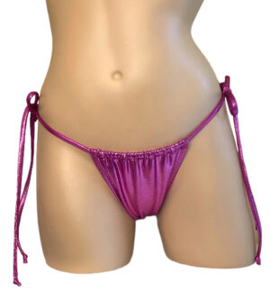 Adjustable cheeky tie side slider bikini bottoms in metallic pink front view