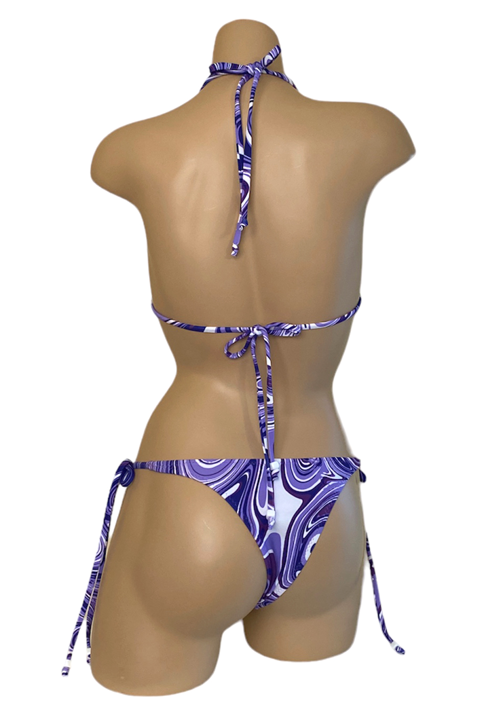 Low waist tie side cheeky bikini bottoms with beaded cord ends and triangle bikini top with beads at center in purple swirl fabric back view