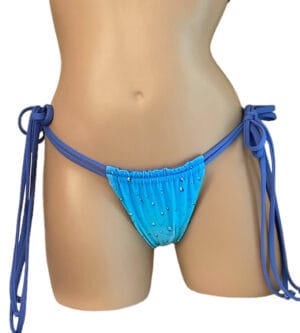 Adjustable double strap slider bikini bottoms in blue rain print with lavendar on the reverse