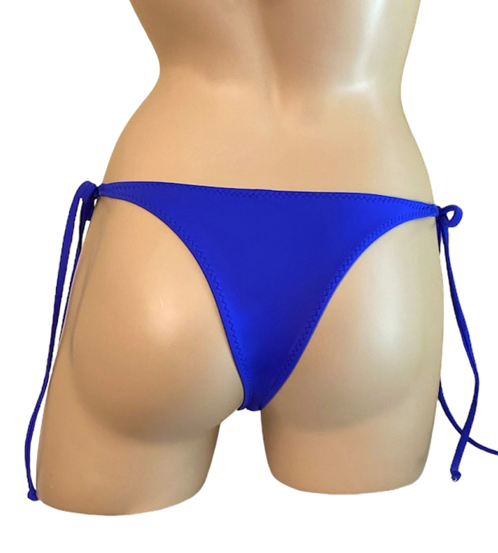 Low waist tie side bikini bottoms with gold side rings in cobalt blue back view