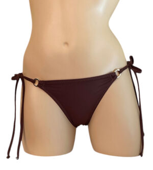 Low waist, ruched back, cheeky, tie side bikini bottoms in mocha brown with gold ring details at waist front view