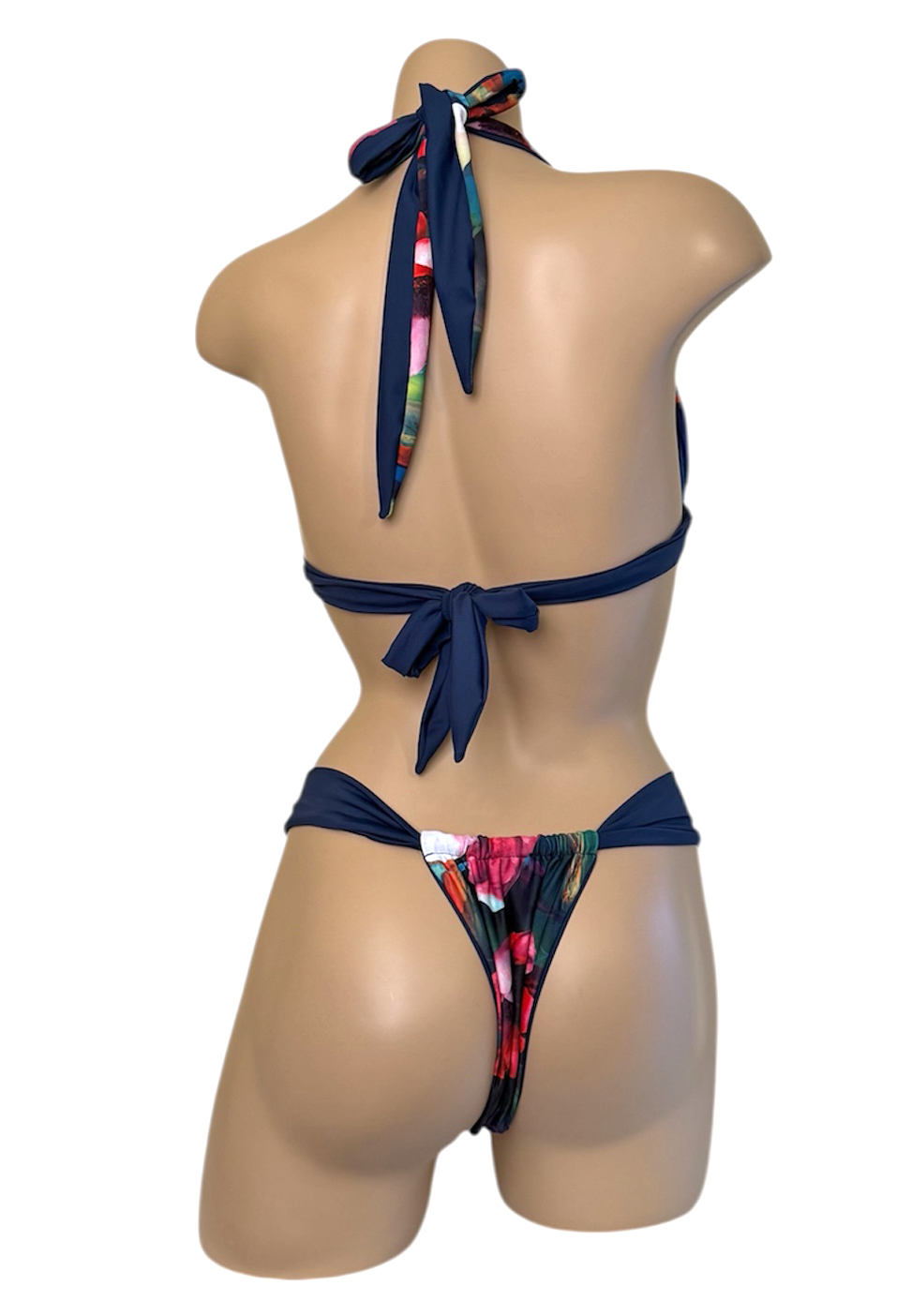reversible slide style bikini bottoms and knotted triangle bikini top in waterlily print back view