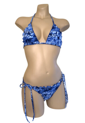 Low waist, ruffle edge, tie side bikini bottoms and ruffle edge triangle top in blue tide print front view