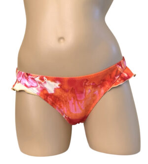 Low waist, cheeky, ruffled bikini bottoms in tropical floral sunset print front view